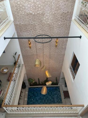 an overhead view of a swimming pool in a ceiling at Riad Reflet D'orient Marrakech in Marrakesh