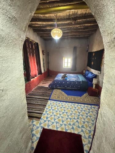 a view of a room with two beds at Guest House For Rent Merzane in Merzane