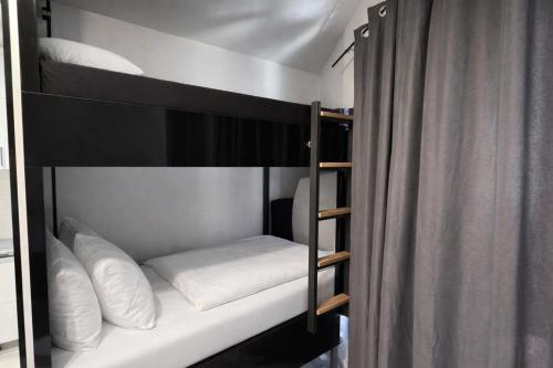 Postel nebo postele na pokoji v ubytování Avis 1