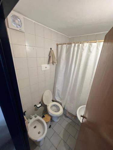 a bathroom with a toilet and a bidet at Corro 8 in Córdoba