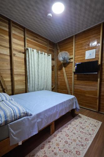 Llit o llits en una habitació de Greenhouse