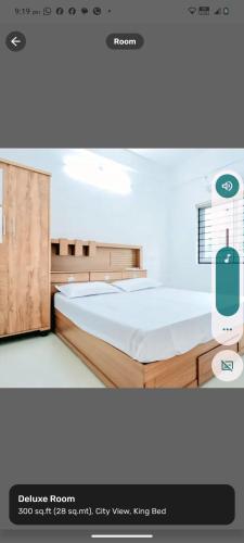 a rendering of a bedroom with a bed at Haya podes in Vypīn