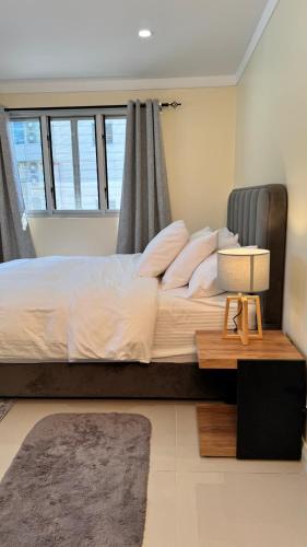 Llit o llits en una habitació de Apartment 44D