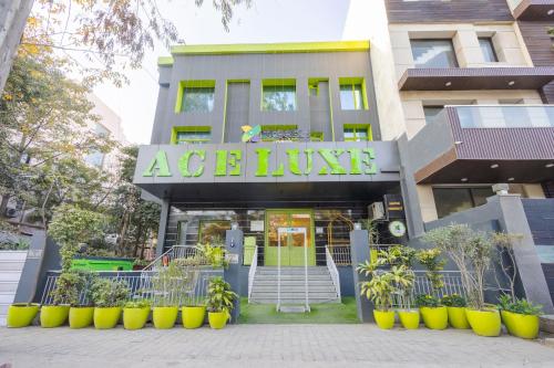 a building with a sign that reads age living at Treebo Ace Luxe in New Delhi