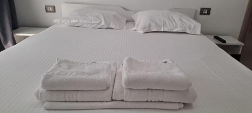 Llit o llits en una habitació de Alezzi Seaside