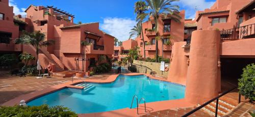 Beachside penthouse with top floor terrace and garage
