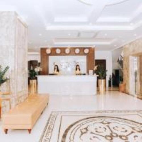 a large room with a counter in a store at Golden Sea Hotel in Ha Long