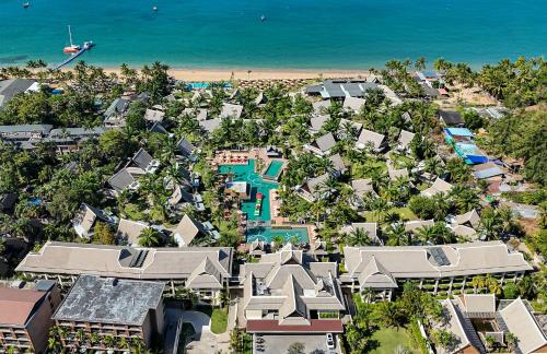 an aerial view of a resort near the beach at La Solaya Khao Lak in Khao Lak
