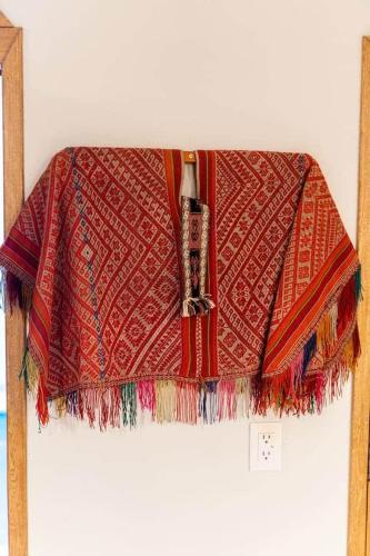 a blanket on top of a window ledge at Casa Rita! Relaxing two bedroom getaway! in Puerto Escondido