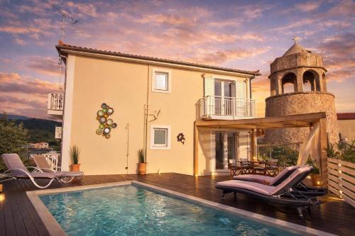 a villa with a swimming pool and a house at Casa Campanario Villa - Charming Nature Villa with Pool in a Picturesque Village By Villa Mana Gers in Agios Leon