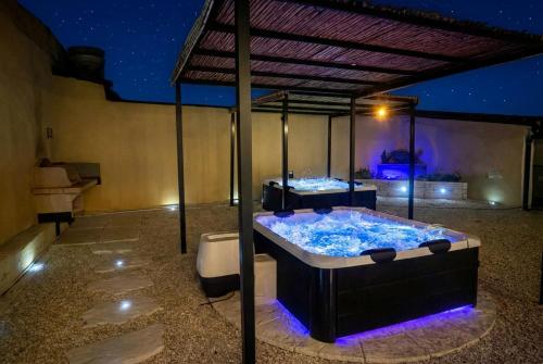 a bath room with two tubs in a room at Costa Ovest Apartment Waves in Nurachi