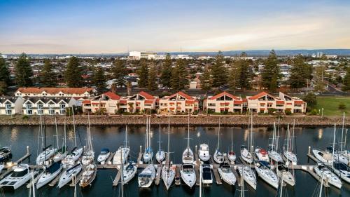 a group of boats docked in a marina at Swainson on Lady Gowrie in Largs
