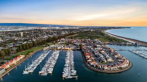 an aerial view of a marina with boats in the water at Swainson on Lady Gowrie in Largs