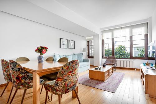 a living room with a table and chairs and a couch at NOA - Sungu 1 in Istanbul
