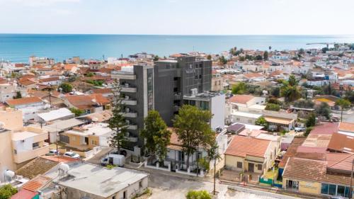 an aerial view of a city with buildings at Warner Boutique Hotel-Adults Only in Larnaca