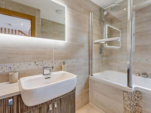 a bathroom with a sink and a shower at 2 Bed in Castle Douglas oc-59638 in Castle Douglas