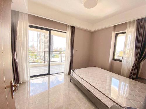 Llit o llits en una habitació de TK Star Condo