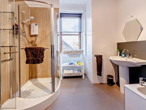 a bathroom with a shower and a sink at 7 Bed in Cupar oc-81242 in Cupar