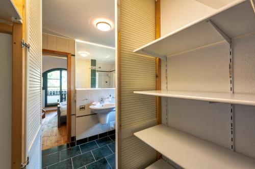 a small bathroom with a sink and a toilet at Strandhaus Ahrensh 2 in Ahrenshoop