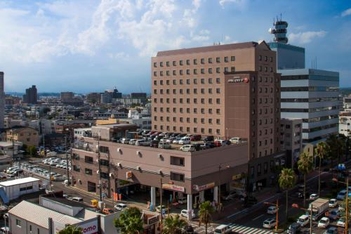 an overhead view of a city with a tall building at Hotel JAL City Miyazaki in Miyazaki
