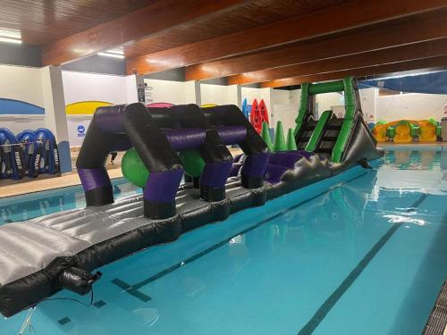 a swimming pool with a gym with a swimming pool at OV19- Wind in the willow summer house in Heysham