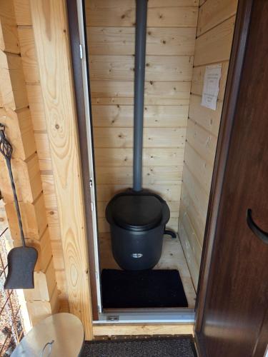 aoutside view of a sauna with a toilet in it at Treetop Tiny House Pod Korunami in Horná Mičiná