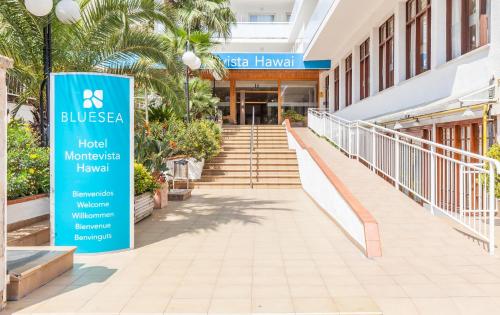 a sign in front of a building at BLUESEA Montevista Hawai in Lloret de Mar