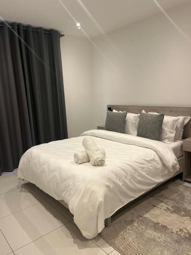 Ліжко або ліжка в номері Prime Aura Properties