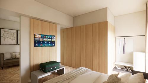 a bedroom with a bed with a suitcase on it at Vivere Hotel in Catania