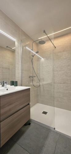a bathroom with a shower and a sink at Les Chalets d'Offaz - Centre Abondance - Alp'in C in Abondance