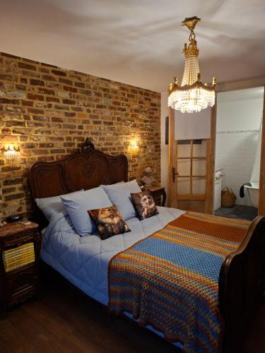 Llit o llits en una habitació de B&B Kerkevelde