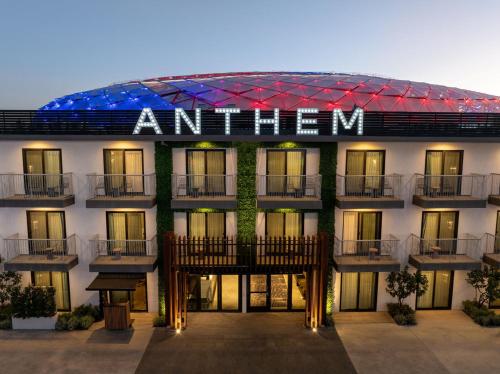 a building with a stadium in the background at The Anthem Los Angeles Stadium District, Tapestry by Hilton in Inglewood