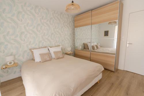 Llit o llits en una habitació de Chez Sylvie