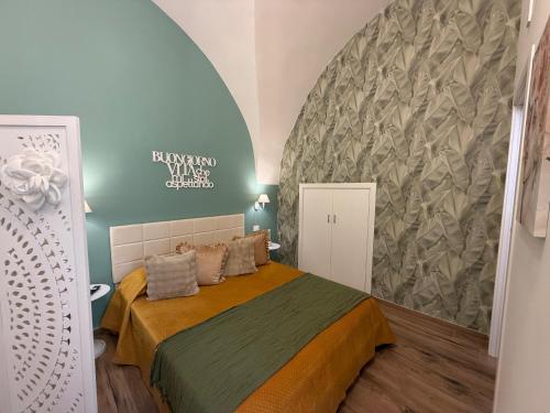a bedroom with a bed in a room at Pepe 25 in Ruvo di Puglia