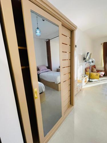 a room with a door leading to a bedroom at vip ghazala in Dahab