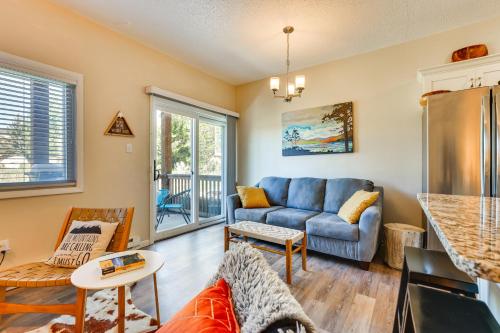 a living room with a couch and a table at Ski Getaway! Mtn-View Condo Near Keystone Resort in Keystone
