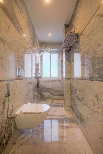 a bathroom with a bath tub and a sink at Samar Villa BnB in Shimla