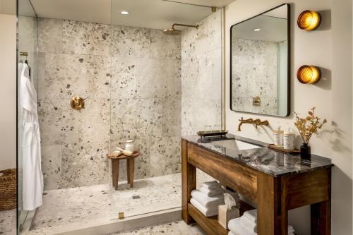a bathroom with a sink and a shower at Claramount Club in Picton
