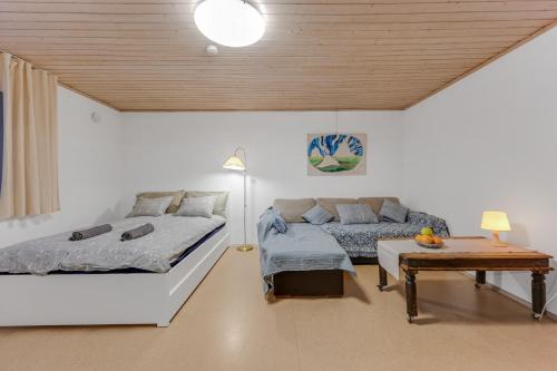 Llit o llits en una habitació de Studio with sauna