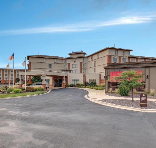 an empty parking lot in front of a building at DoubleTree by Hilton Bloomington in Bloomington