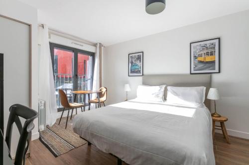 Krevet ili kreveti u jedinici u okviru objekta L'Escapade Paris