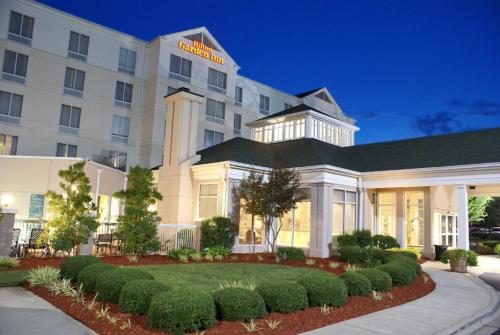 a rendering of the exterior of a hotel at Hilton Garden Inn Charlotte North in Charlotte