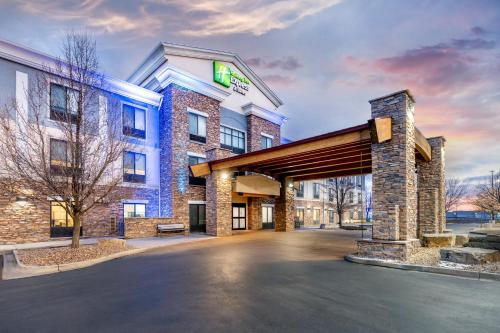 a rendering of the front of a hotel at Holiday Inn Express Hotel & Suites Loveland by IHG in Loveland