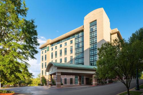 a rendering of the front of a building at Embassy Suites by Hilton at Hot Springs Convention Center in Hot Springs