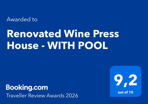 a blue sign that reads renovated wine tasting house with pool at Renovated Wine Press House - WITH POOL in Porto de Mós
