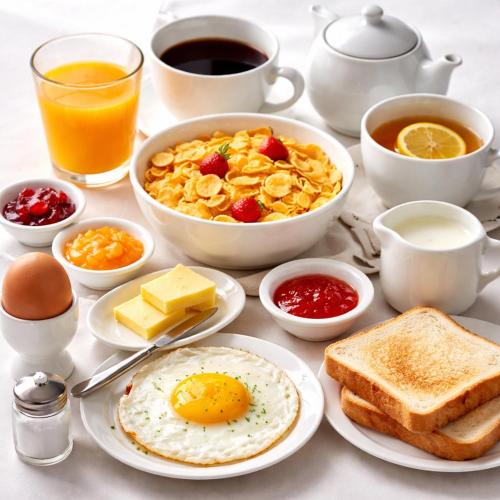 a breakfast table with eggs and toast and coffee at Cozy Private Room & Breakfast Dublin 15 in Tyrrelstown