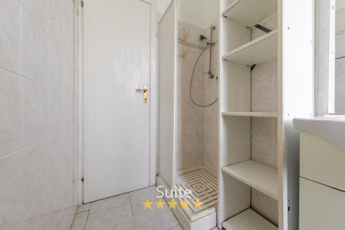 a bathroom with a shower and a walk in closet at Casa dell'amicizia in Milan