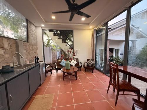 a kitchen with a sink and a counter top at Peaceful Hilltop Duplex Central Phu Quoc in Phú Quốc