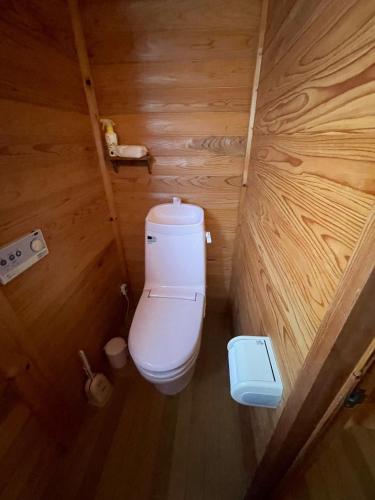 an overhead view of a toilet in a wooden room at Jurakuji - Vacation STAY 15239v in Awa