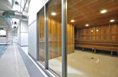 a empty gym with benches in a building at BC Place & Rogers Arena Downtown Modern Condo in Vancouver